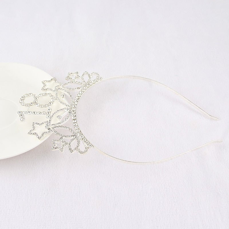 Rhinestone headband for women with elegant design and shimmering stones, perfect for enhancing any hairstyle.